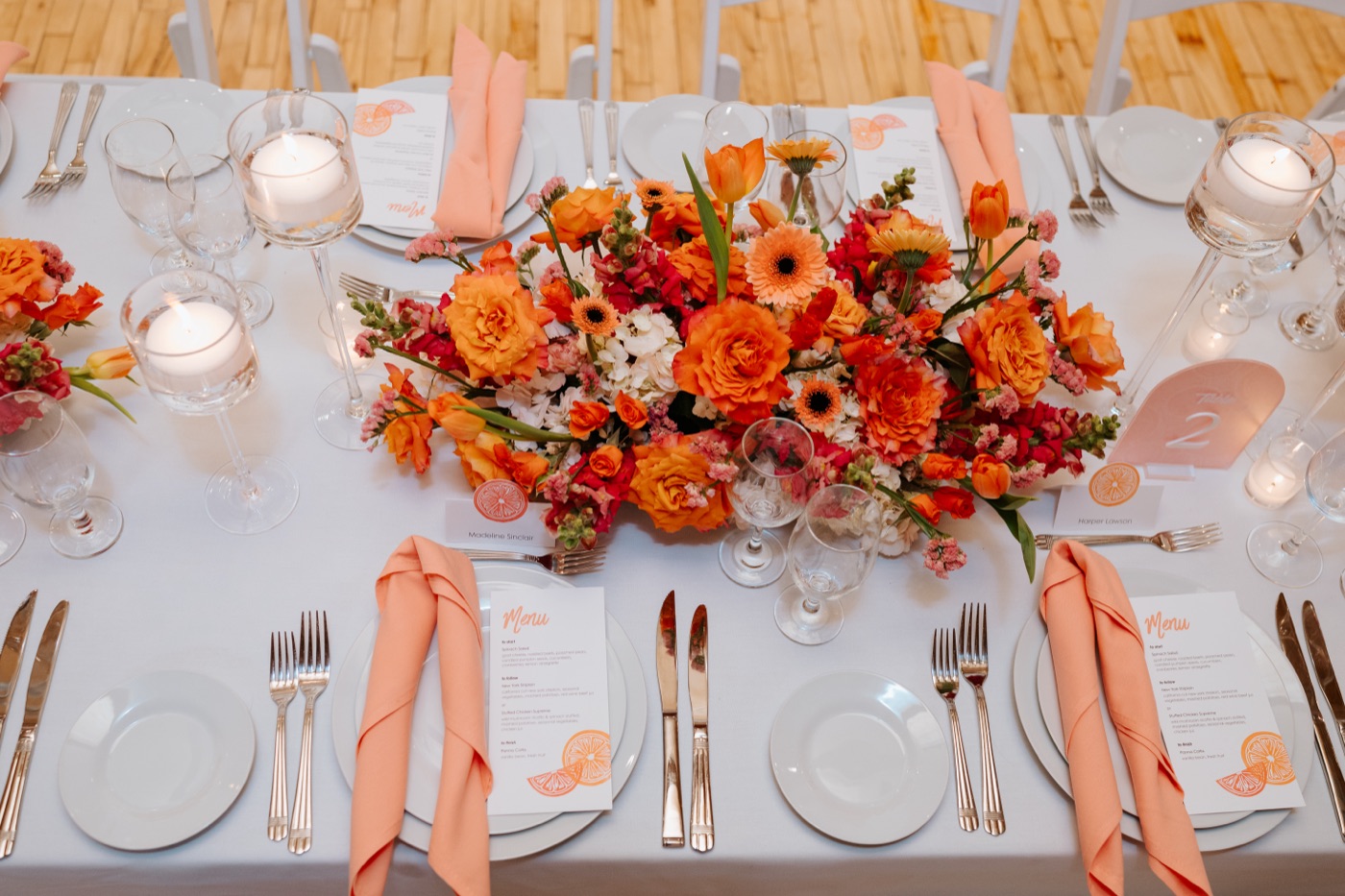 Coral-toned wedding tablescape